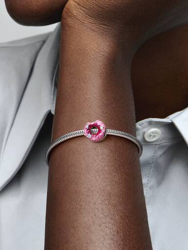 Funkelnder Donut mit Streuseln Charm